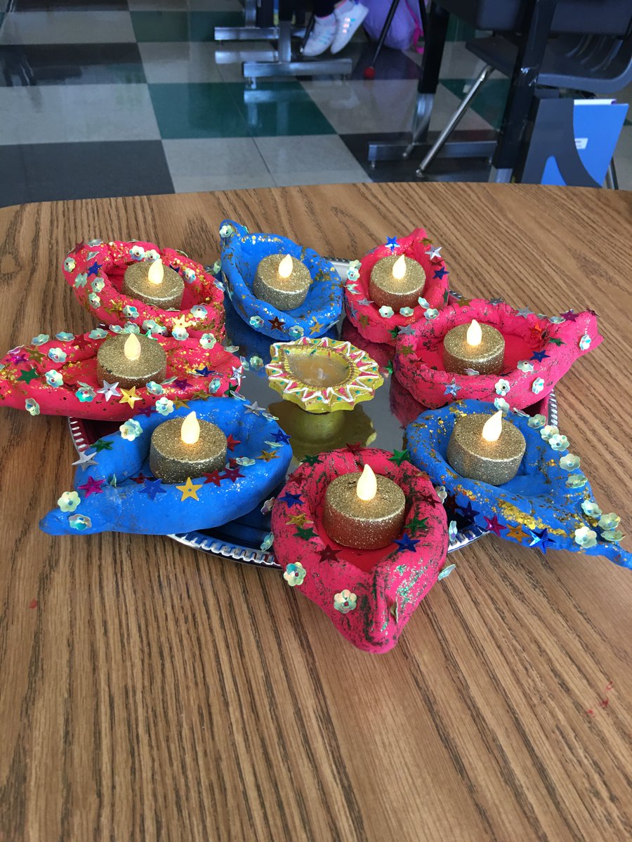 Mrs. Bova's grade 1 class created diyas for Diwali.  They  model magic, glitter glue, shiny stars and flowers.  They added a tea light in the centre.  the children were very excited to take them home and share with their families. Happy Diwali! @WinnipegSD <a href="/Bova_WSD/">Francesca Bova</a>
