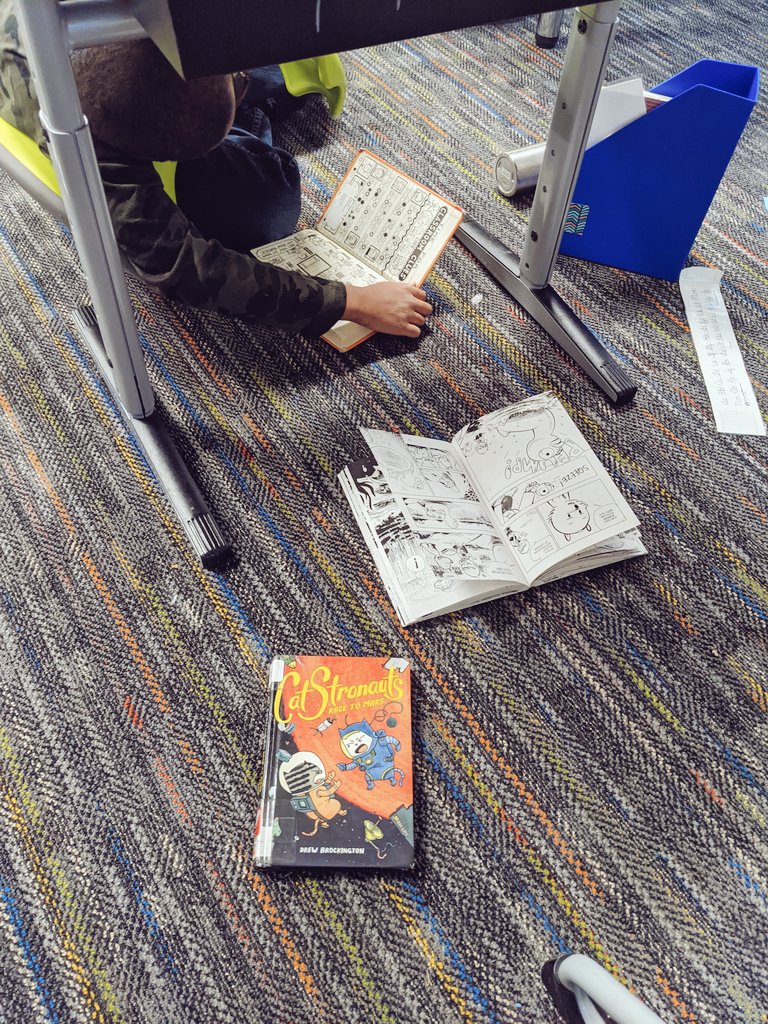 Cooper___Payton's tweet photo. A boy and his books, it's a beautiful thing. https://t.co/NemUrPECLt