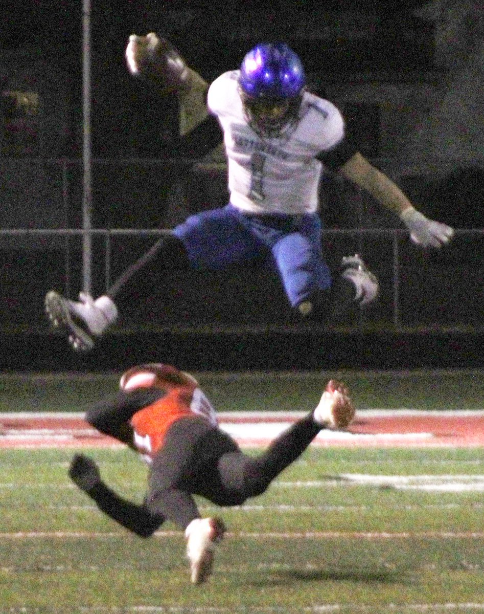 Plattsmouth's Christian Meneses went airborne on this play to escape a potential tackle by Aurora in tonight's Class B semifinal game.