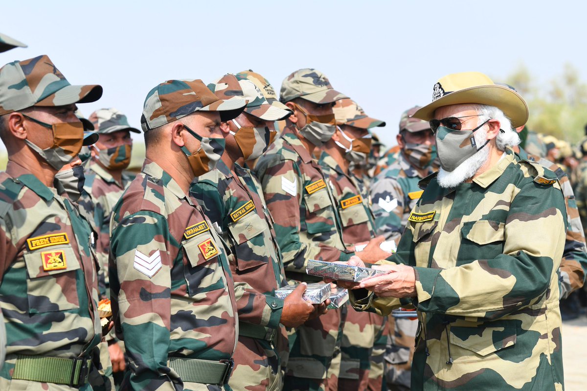 narendramodi's tweet photo. Every year, I cherish spending Diwali with our security forces. It is a way of reaffirming our solidarity with them, as they bravely protect the nation and ensure our country can scale new heights of progress. 

Here are some glimpses from Longewala today. https://t.co/hhtj4S7Gyp