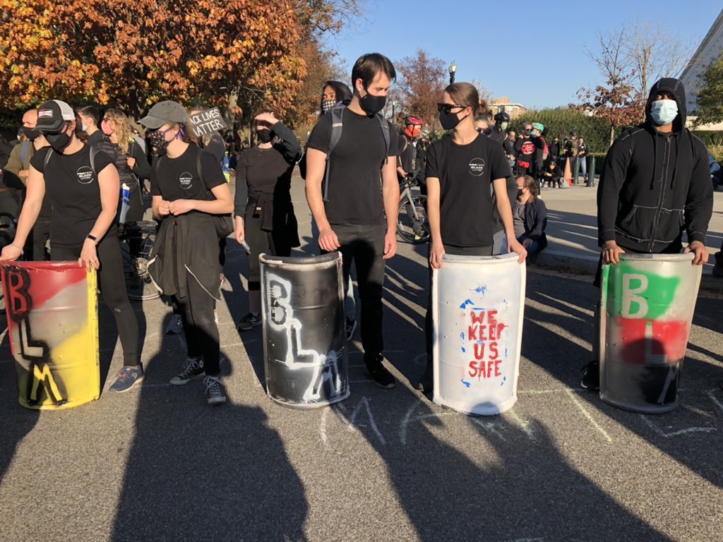 Some of the counter protesters near the Supreme Court have these shields ready.