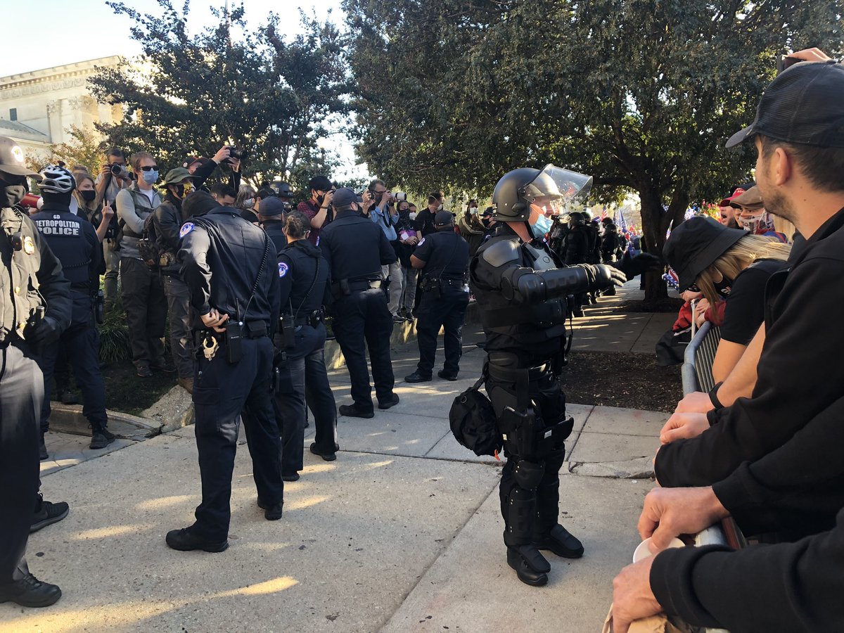 The scene here near the Supreme Court, where Trump supporters and counter protesters are screaming at one another — the US Capitol looming in the background