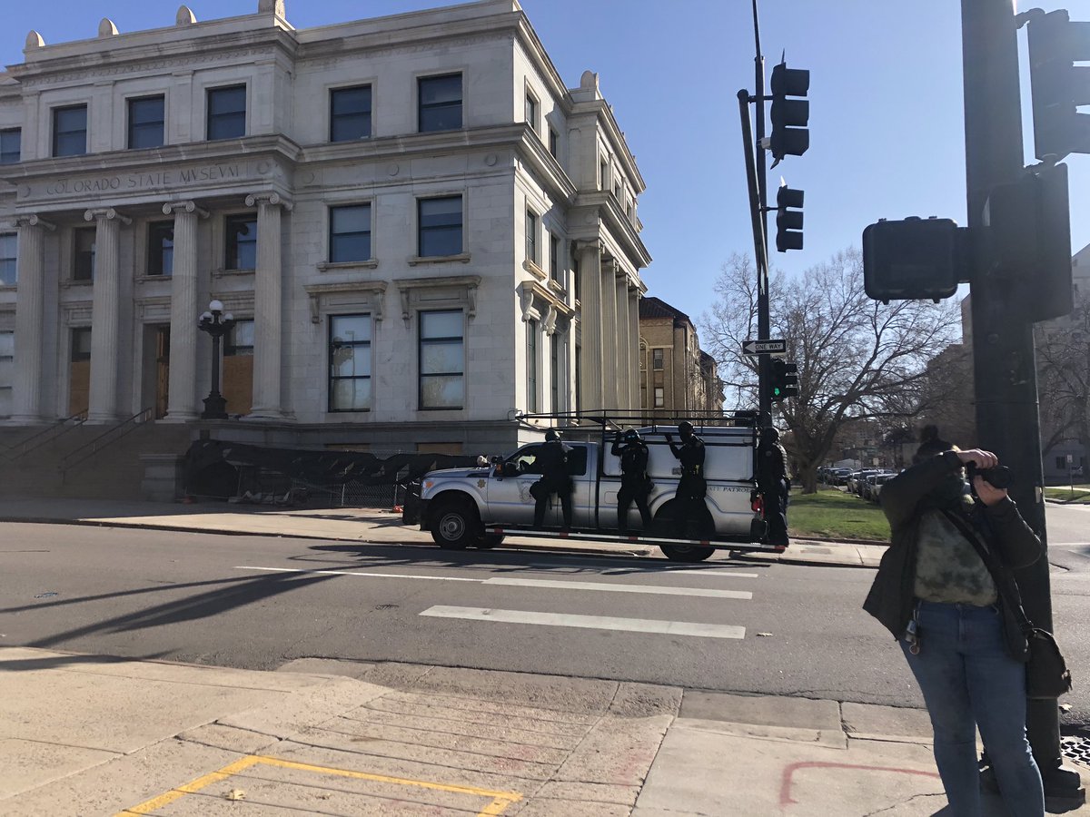 VinnieChant's tweet photo. Circling the march, the aforementioned over-armored police truck. #DPDActivity https://t.co/UeZ1tjUaxO