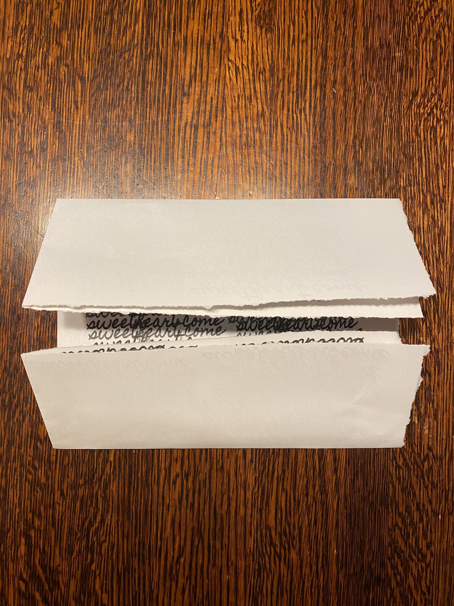 8/ after the page is trimmed to size, I folded it down. First I folded in half, then I folded the bottom and top roughly to the middle. Finally I folded the left and right sides into the middle.