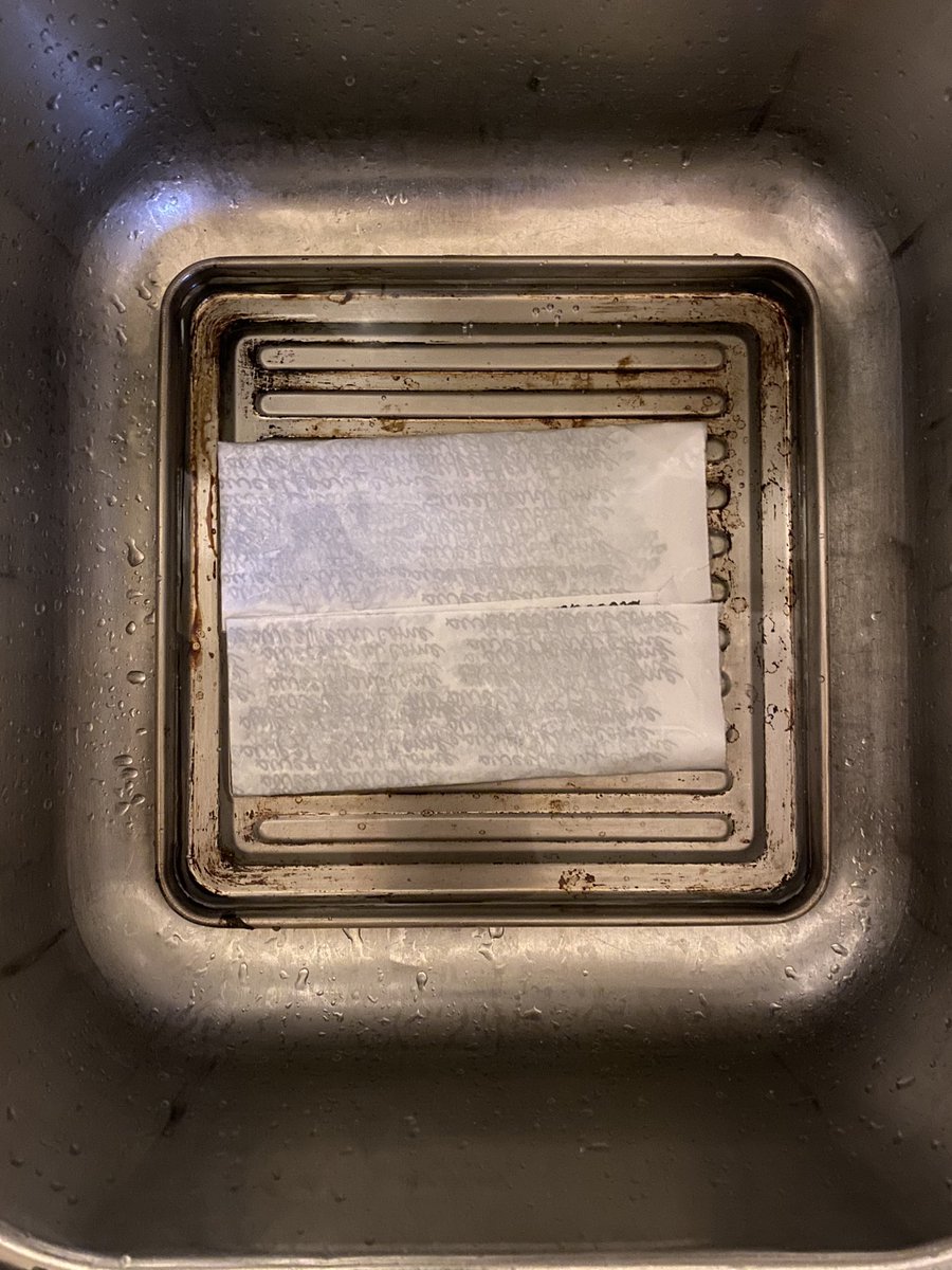 12/ first I soak the prop briefly in some plain water in our sink. Then take the paper out, dump out the water, fill the tray with the decaf coffee mixture, and into this lovey bath goes the damp paper