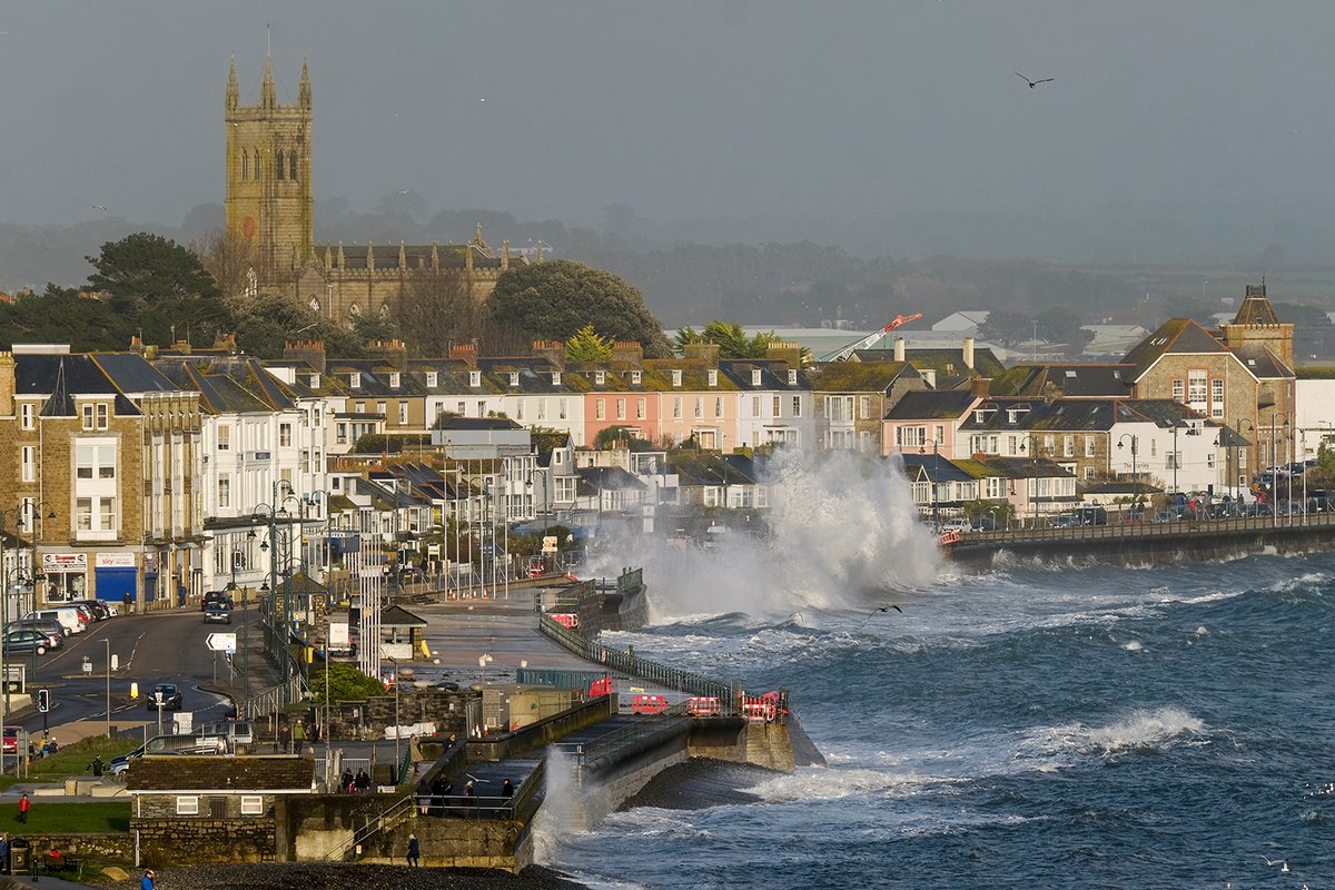 photogregmartin's tweet photo. With flood alerts issued for most of Cornwall today, Penzance saw some spectacular waves at high tide this afternoon, timed perfectly to coincide with a gorgeous sunset. #StormHour @CornwallLive https://t.co/te57ABewiE