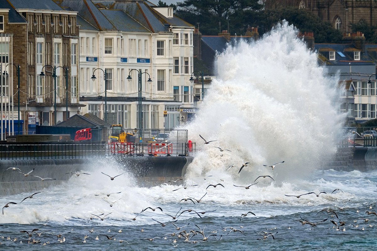 photogregmartin's tweet photo. With flood alerts issued for most of Cornwall today, Penzance saw some spectacular waves at high tide this afternoon, timed perfectly to coincide with a gorgeous sunset. #StormHour @CornwallLive https://t.co/te57ABewiE