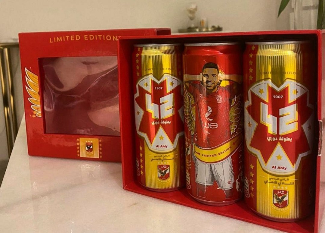 BeatMarketing's tweet photo. #CocaCola celebrates the 42nd CAF Champions League with this limited edition as a tribute to @MoamenZakaria, @AlAhlyEnglish player who was diagnosed with amyotrophic lateral sclerosis. We wish him speedy recovery  ! https://t.co/qPpka2E4j1