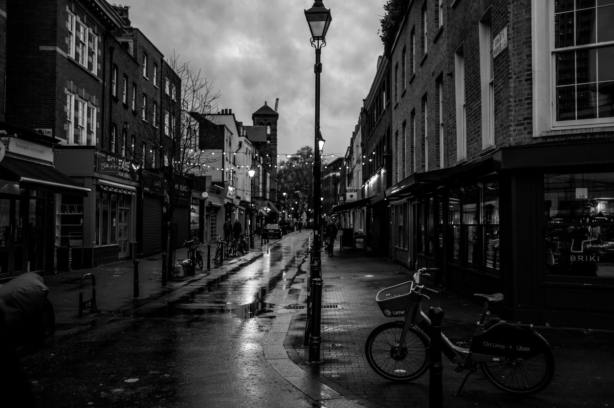 Clerkenwell in the lockdown rain. Unlike earlier this year, plenty of London’s shops and cafes have remained open during the second shutdown - with punters huddling outside. All of the area’s best restaurants are sadly still closed for another week.  http://instagram.com/sebastianepayne&nbsp;