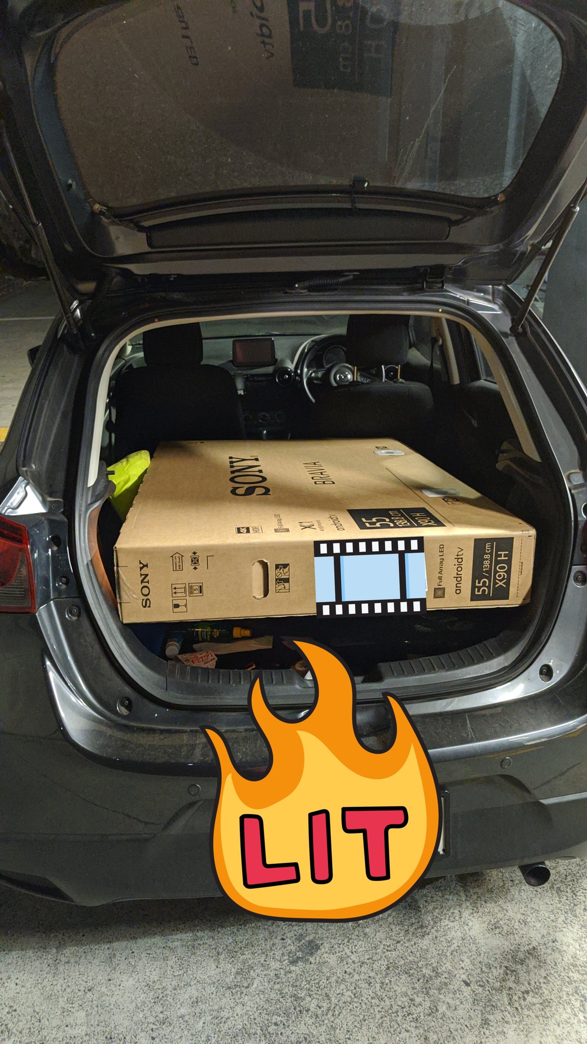 yiggs on Twitter "Fit a 55inch Tv into a Mazda 2. I'm 6ft, driving
