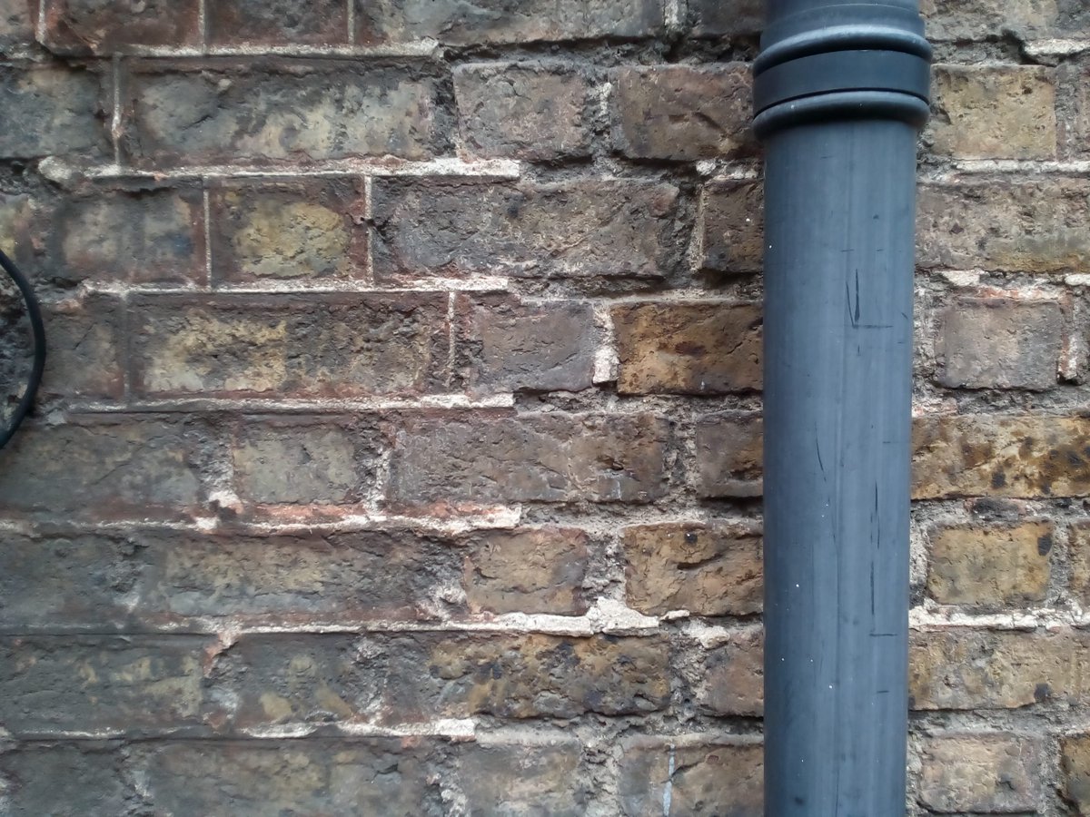 SPABIreland's tweet photo. On #NationalGuttersDay, check that your downpipes take water away from your building, into an (unblocked) drain/gully. If water is always running down the face of a wall, it can cause mortar erosion, encouraging plant growth, interior damp &amp; full on leaks! #IrishMaintenanceWeek https://t.co/wCusZ84esM