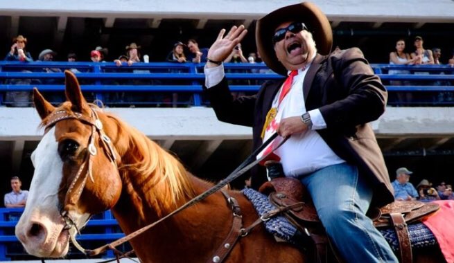 All smiles, Naheed “Fine Line” Nenshi A.K.A. The Mayor, has no choice but to carefully balance atop his horse. If he leans a little too much in either direction it will be a quick topple to a mouthful of sod.