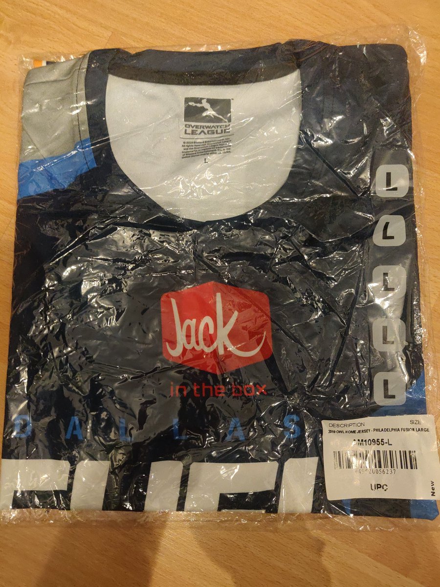 Packed jersey of the OWL team Dallas Fuel with a Philadelphia Fusion barcode on it