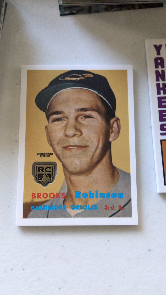 NotNolanRyan1's tweet photo. This card is really growing on me. Brooks looks like he’s cheesing. 60+ year old photo of an absolute legend. He KNOWS he’s about to hold down the hot corner for 20 years. @Orioles cc: @brooksbreaks1 #Ripsgiving https://t.co/2tckjU0RdY