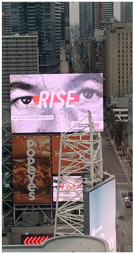 MKMediaBiz's tweet photo. Raising The Roof billboard at Yonge and Dundas. Rise indeed! Thank You #brandedcities Excellent creative by #thelocalcollective End homelessness now! #homelessness https://t.co/3qAwmLGa1T