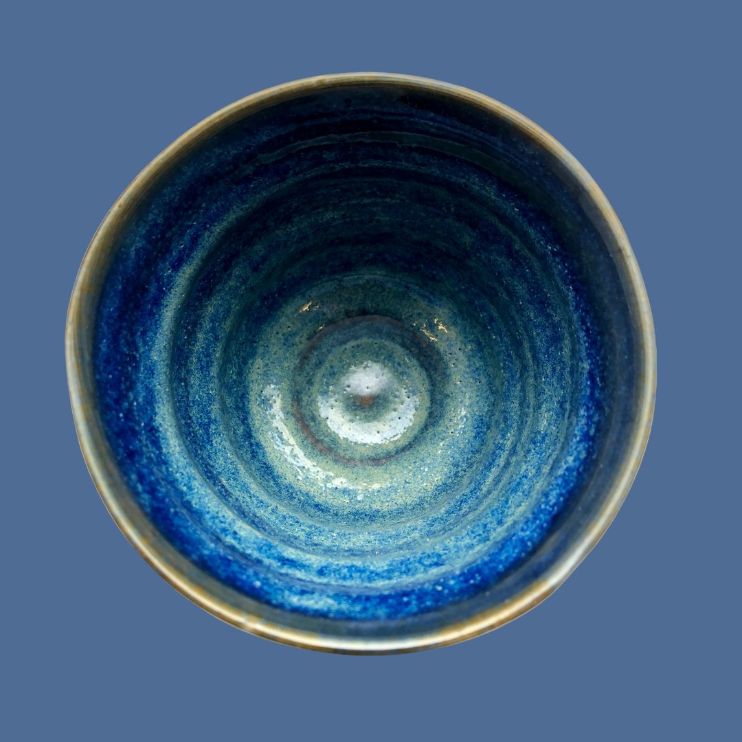 This is a Yunomi a Japanese teacup.  Each of our beautiful yunomi is unique, handthrown by the amazing Woodsetton Pottery. It has been said by some that it looks like Van Gogh's Starry Night.  
#greentea #teacup #tea #japanese #matcha
