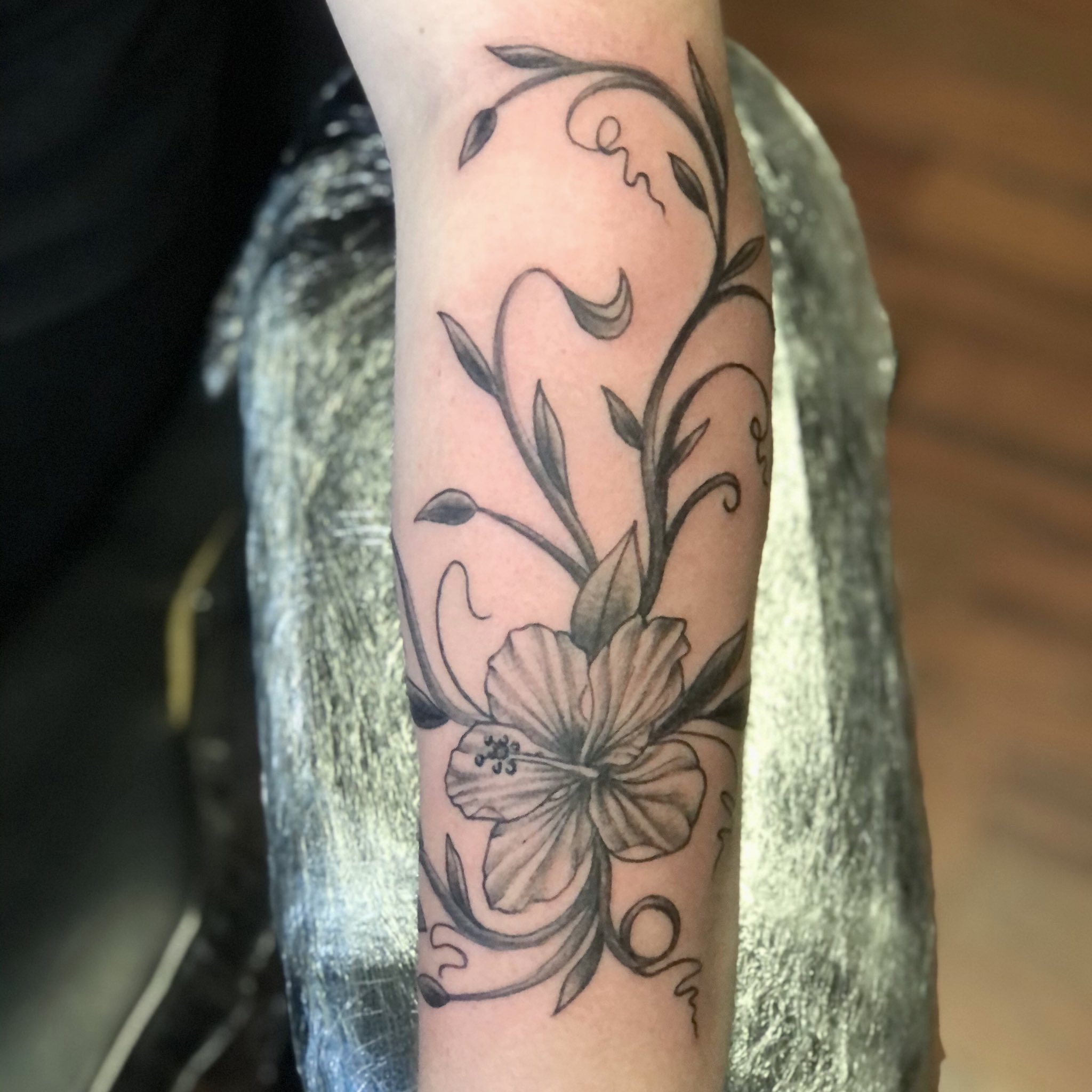 Wrapping hibiscus tattoo by Zaya Hastra  Tattoogridnet