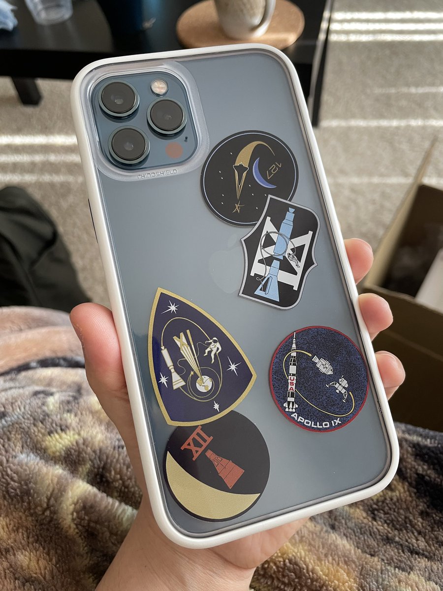 iAm_erica's tweet photo. Oh my goodness! Now this is awesome #Rhinoshield I love the NASA stickers, white bumper &amp; custom buttons with this blue #iPhone12ProMax!!! @GetRhinoShield I haven’t worked with them in a while. #ModNX the phone is even bigger now but actually more comfortable to hold. https://t.co/XriTDWqkjy