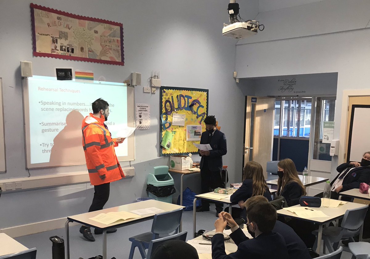 AanDrama's tweet photo. Mr @GMartinAAMaths sharing a great moment with Rhys and quite literally brightening up a classroom based Drama lesson on a pop in to y8 today! Super vocal tone Mr M and wonderful cross curricular links with all those numbers. #hivisdrama #AChristmasCarol #leadingprogress https://t.co/bOp70M2PXf