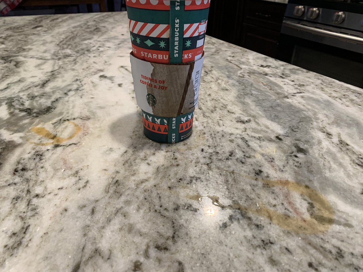 TheChaseIsOn1's tweet photo. @Starbucks you need some quality checks with your cups. I haven’t taken one sip yet and lost 1/4 cup of my coffee seeping from the seam, and I have a pool of coffee in my trucks cup holder. #dobetter https://t.co/35X7TGtR29