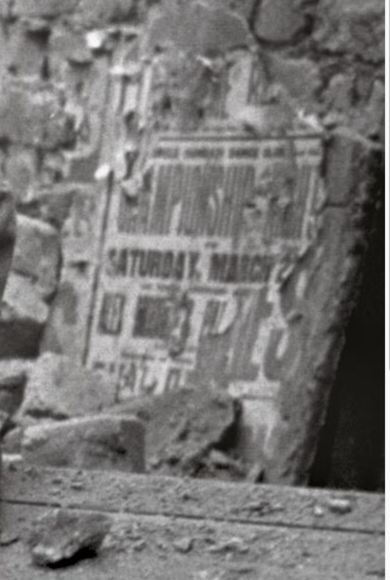 Okay, so this is what we do know: Toni Frissell took the picture somewhere in England (London, I think) in 1940.I don't know if this will be useful, but here's a close-up shot of the poster behind her.
