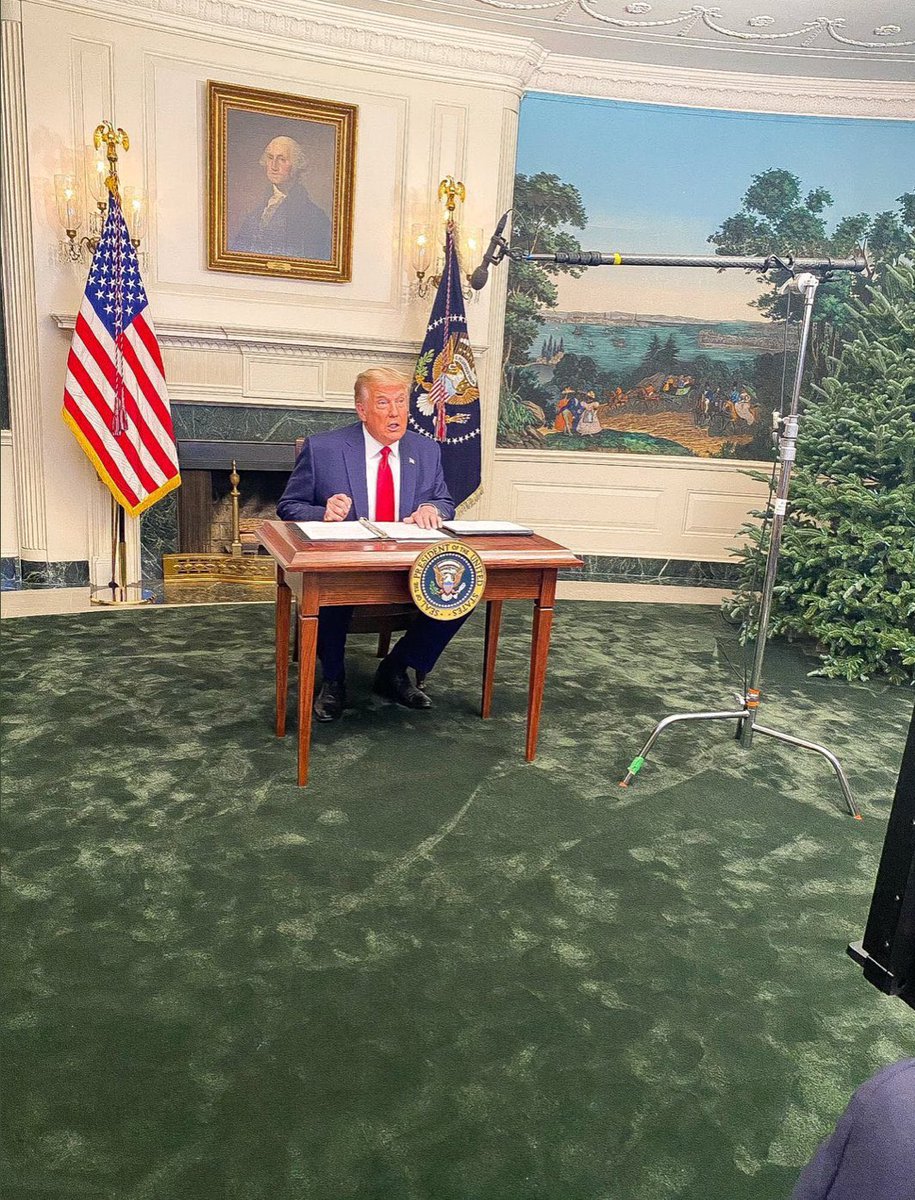 This picture has gotten a lot of attention because of the tiny desk and weird room decor. But geek-Americans like me are focused on something else: the microphone boom and stand, which are emblematic of this administration’s distain for expertise. Let me explain.