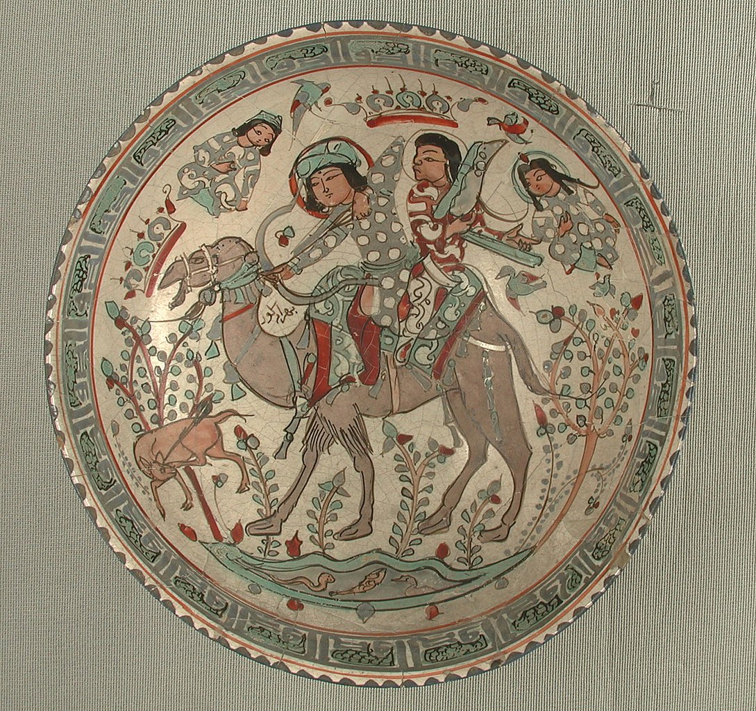 A mina'i ware bowl showing the Sasanian hero Bahram Gur on a camel with Azadeh; overglaze enamels painted over tin-opacified glaze, late 12th-/early 13th-century Iran:  https://www.metmuseum.org/art/collection/search/451389