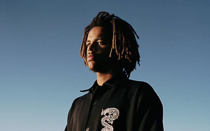 CharlotteRyanNZ's tweet photo. Up-and-coming Raglan musician Muroki performs LIVE at 2pm @radionz - He is on the verge of a massive career. He's the first artist to be signed to @BENEEMUSIC's new label Olive, and Elton John is a fan of his music too! https://t.co/yTWXuQEz63