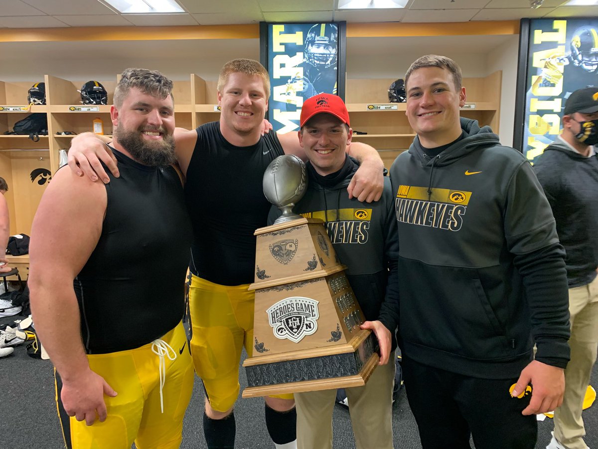 CRKFootball's tweet photo. 4 Kennedy football Alum with the “Heroes Trophy” today after the Iowa game! Jacobus 16’, Beyer 16’, Maus 17’ &amp; Heitland 14’. Roll COUGS! https://t.co/mCRsnaOrfN