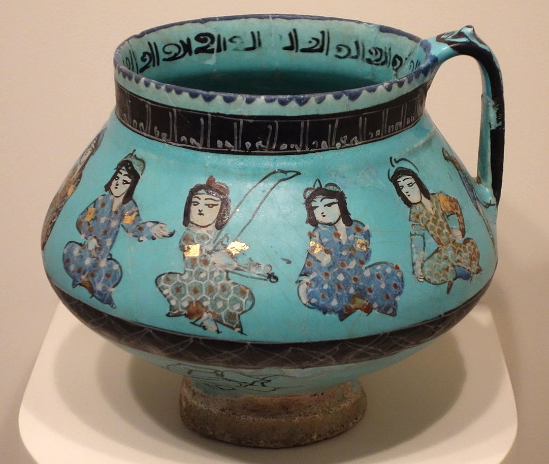 A mina'i ware jug with seated figures and sketches, made in Central Iran in the late 12th or early 13th century, earthenware with polychrome enamels and gold over a turquoise glaze; now in Cincinnati Art Museum:  https://commons.m.wikimedia.org/wiki/File:Jug_with_seated_figures_and_sketches,_Mina%27i_ware,_Central_Iran,_Seljuk_period,_late_12th_or_early_13th_century,_earthenware_with_polychrome_enamels_and_gold_over_turquoise_glaze_-_Cincinnati_Art_Museum_-_DSC04014.JPG