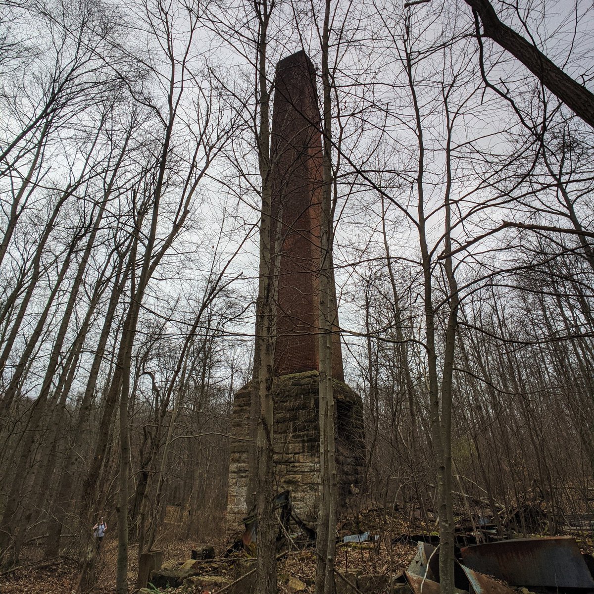 Pictures as usual don't capture the scale well but you can spot Bethany in the last pic here if you want to get an idea of how massive this thing is. Remarkably well preserved too. Just been sitting back here for a century plus. These trees weren't here when it was built.