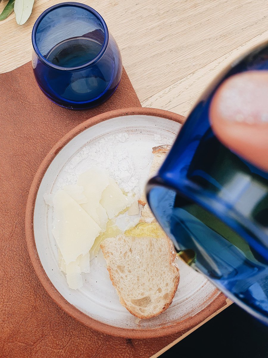 litlhedonistCPT's tweet photo. Albeit a bit blustery, Gert soon captivated our minds as he lead us through an informative olive oil tasting before lunch.  This humble little fruit can be transformed into an incredibly versatile oil that adds dimension and depth to all dishes.#IntOliveTreeDay #TokaraOliveOil https://t.co/imx3ebmFIK