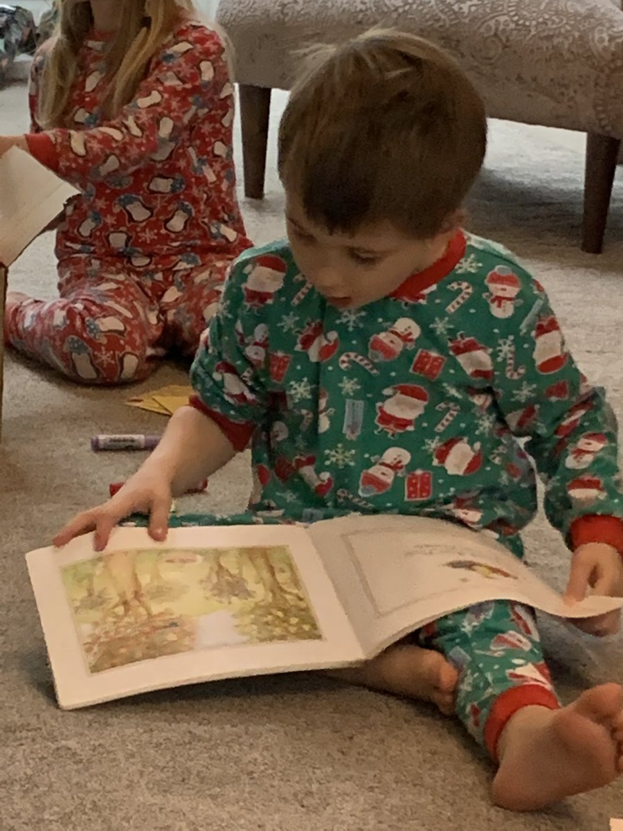 LisaWildman6's tweet photo. Saturday morning reading in his pjs! Flynn loves his new book this week! 📖 @BissMrs @miss_stickley @MapleCrossJMI https://t.co/PDSMHSaFRl