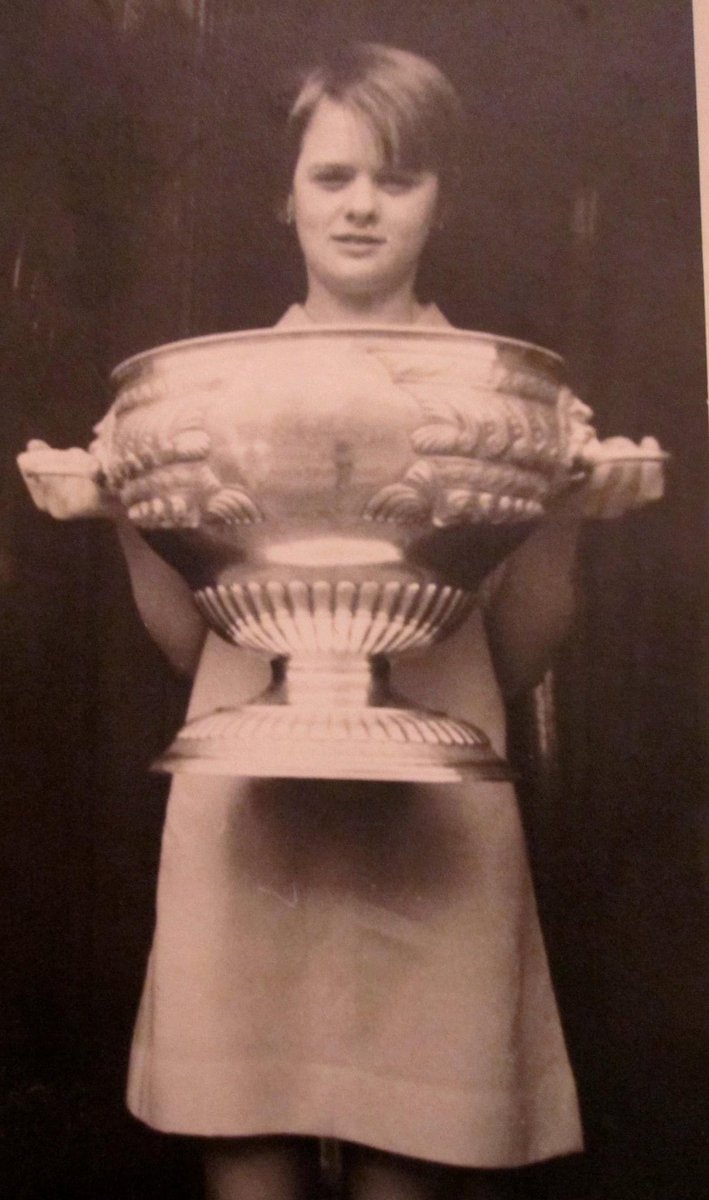 Shellhiggins147's tweet image. Been in the loft for the Xmas decorations. Found this gem. 1968 Norther Ireland Amateur Championship. My uncles first win. Here’s my mummy at 14 with the trophy. Think it’s still played today and @Robbiemcg147 in this years final?
