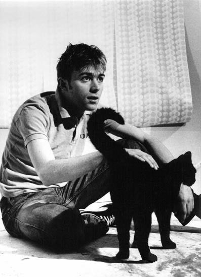 A boy and his feline.