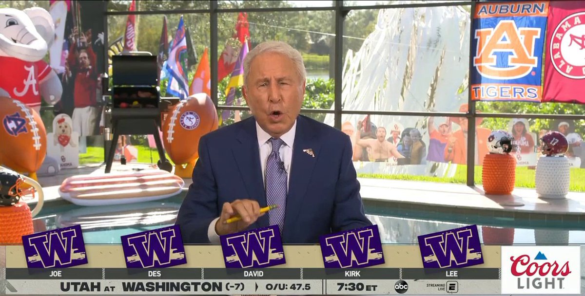 Cougwill's tweet image. Some solid #BobRob shots late in the show. It almost looks like Coach is booing the Montlake crew, while flying @olcrimson in the background. #GoCougs #WaveTheFlag