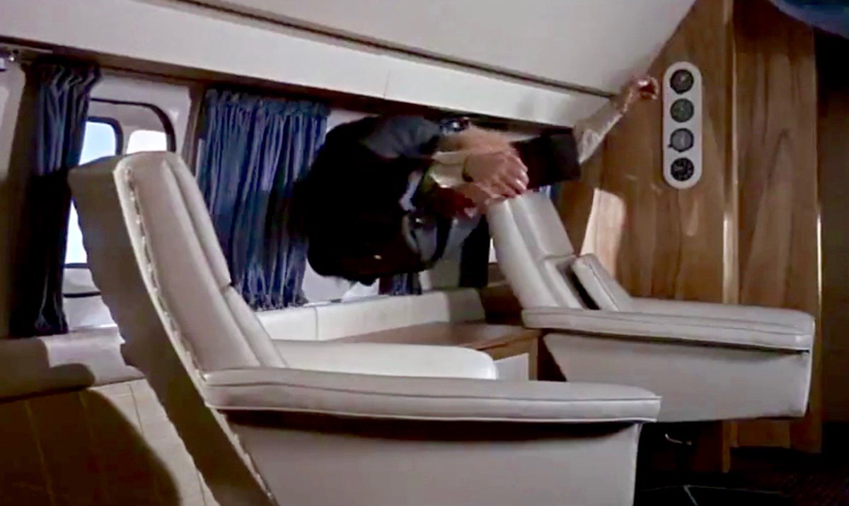 Spoiler alert:  At the end of the film (1964), Goldfinger is ejected from the plane against his will.