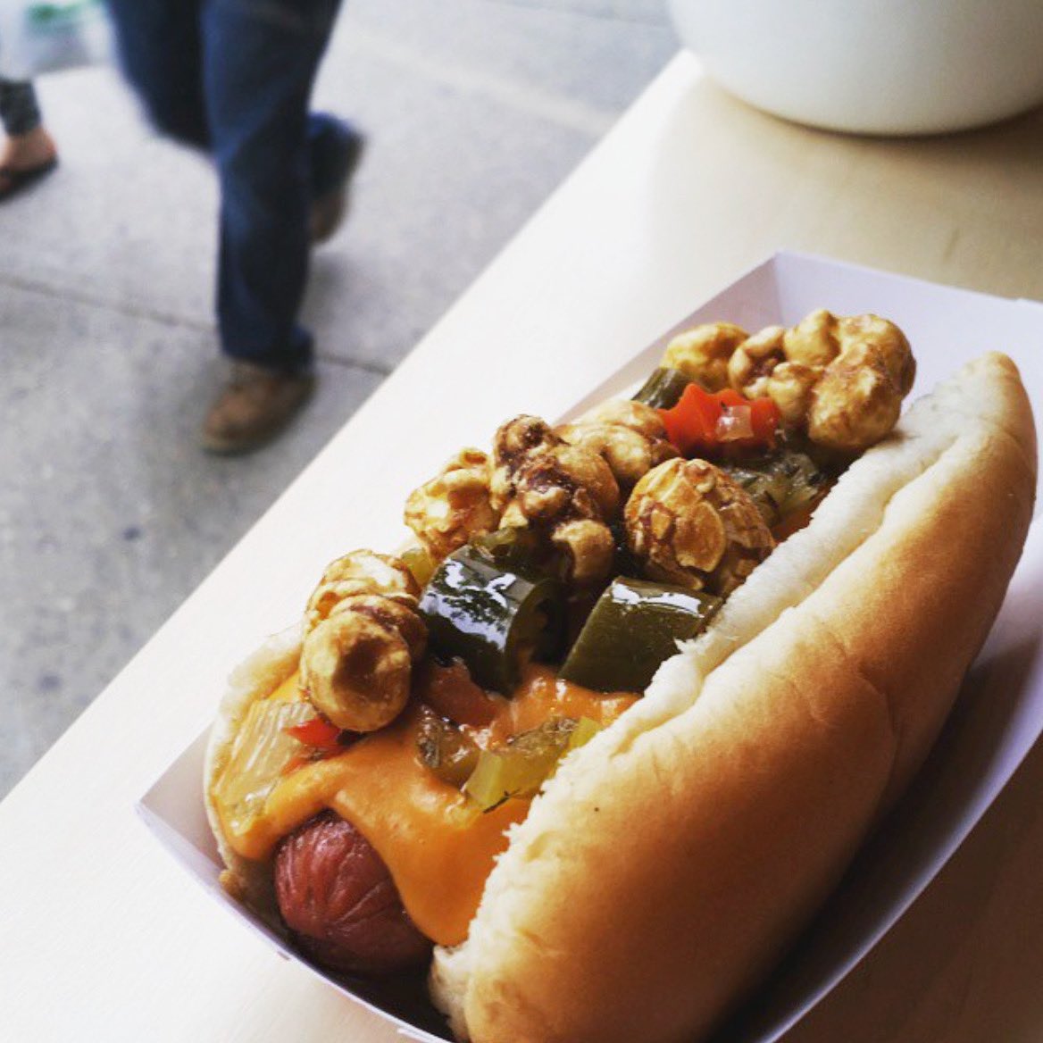 onodoginc's tweet photo. We've seen it all. From standards like relish, mustard, and ketchup - all the way to the strange - like this classic Chicago dog from #weinershop that rolled out the Windy City Disaster that is topped with CARAMEL CORN! What are some of your favourite hotdog toppings? https://t.co/FkkvKVlRKr