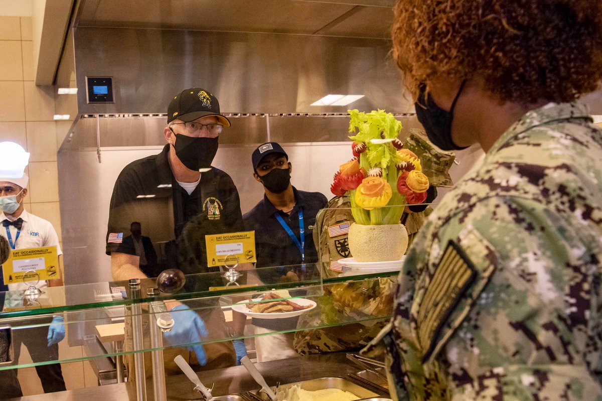 Lisa_Ferdinando's tweet photo. Acting Defense Secretary Christopher C. Miller serves #Thanksgiving dinner &amp; dines w/ @USNavy sailors and @USMC #Marines at @NSA_Bahrain, Nov. 25. https://t.co/9m6R52Nxii