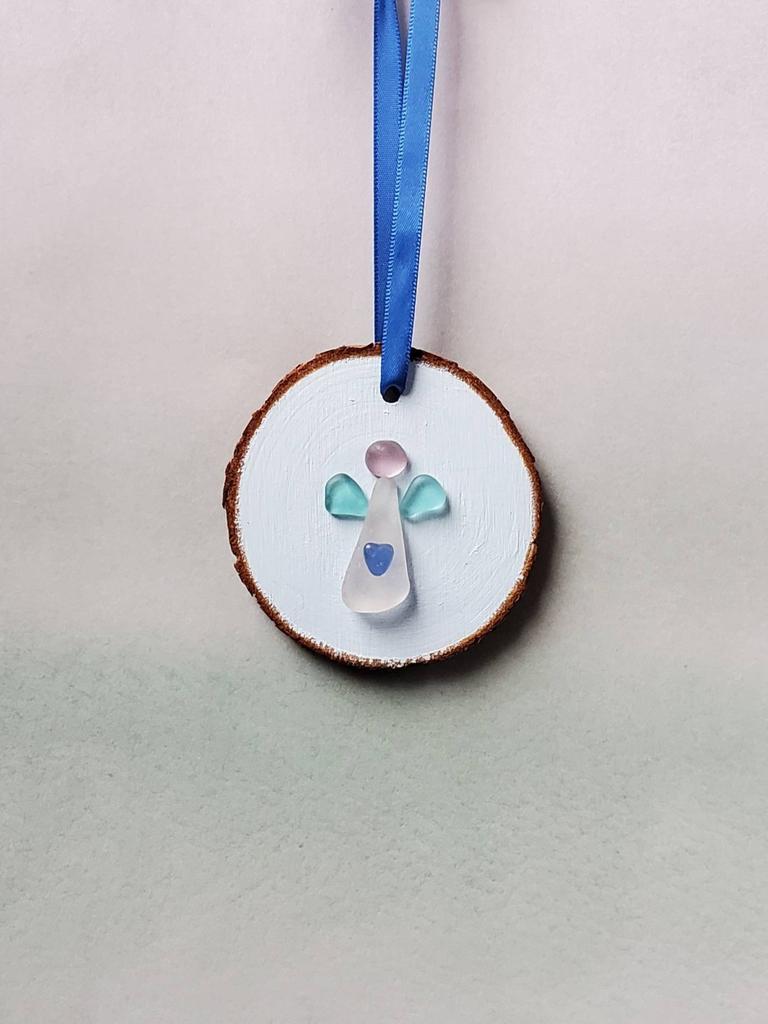 saltedbayonet's tweet photo. Thanks, EL! ★★★★★ "WOW, what an angelic seaglass angel! Pictures do NOT do this ornament justice since they cannot capture the 3D aspect.  Simply beautiful, quality sea glass gems. Well crafted. It will be a family treasure for years to come." https://t.co/mwkYkKXquN https://t.co/h5DGwO3XmV