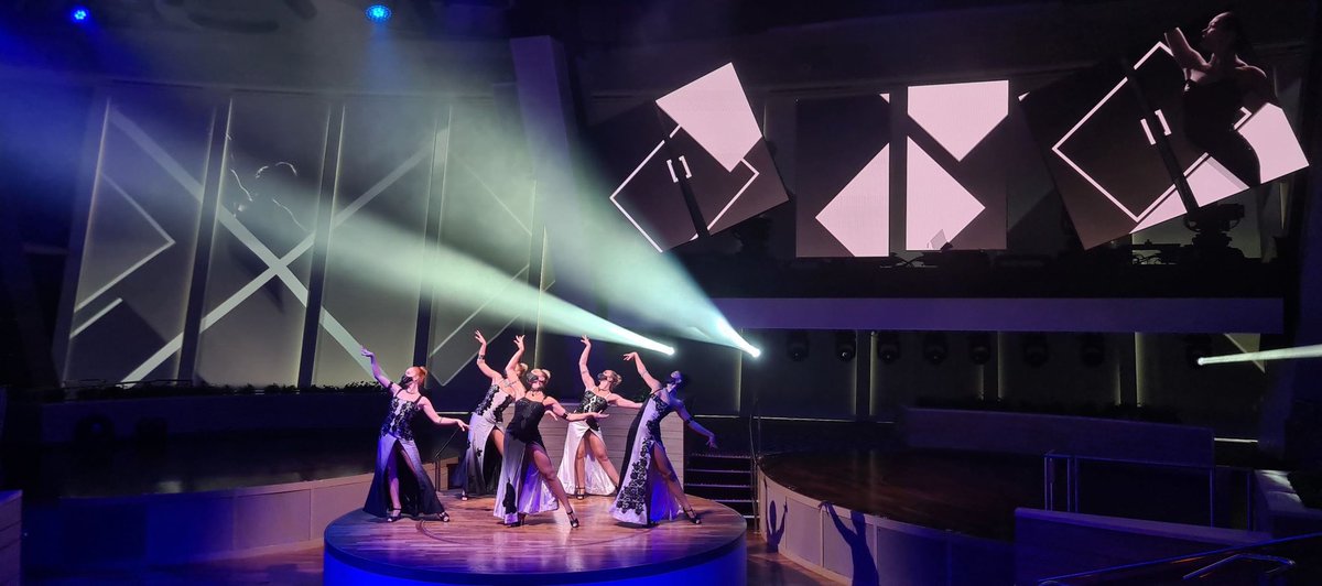 NickWeirShowbiz's tweet photo. It’s early days and a long road ahead, but LIVE SHOWBIZ IS BACK! The #Showgirl returns to Planet Earth! The entire entertainment industry is in this together and we fight as one. #RoyalCaribbeanProductions is proud to be out front, taking some of the first steps. #makingmaskssexy https://t.co/U5zDH3OMWM