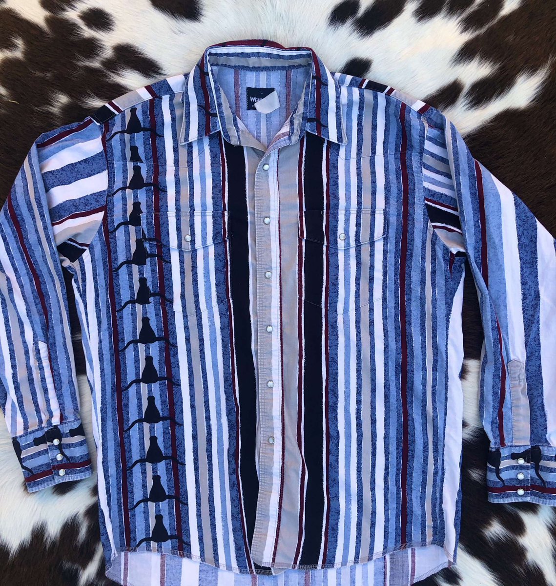 CowboyKillersVg's tweet photo. Did a little photo album digging and found this picture of my dad in the early 90s 🤍 There is paisley Panhandle Slim still available on the website that is very similar to this one, plus it’s on sale ✨

• Check out these other vintage shirts still available on the website! https://t.co/hOZvKhwhDK