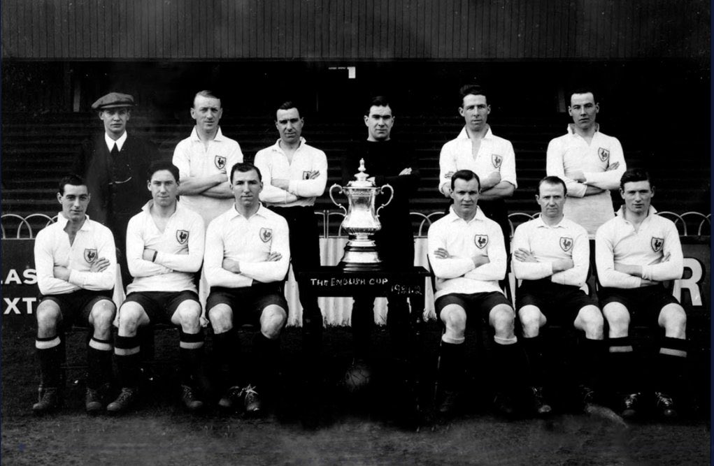 1920:The team clinched the Second Division championship in style, unbeaten at home, 103 goals.1921:Second FA Cup triumph, Spurs beating Wolverhampton Wanderers 1-0 at Stamford Bridge. 1934:The old East Stand at the Lane is completed, including the iconic 'Shelf'.