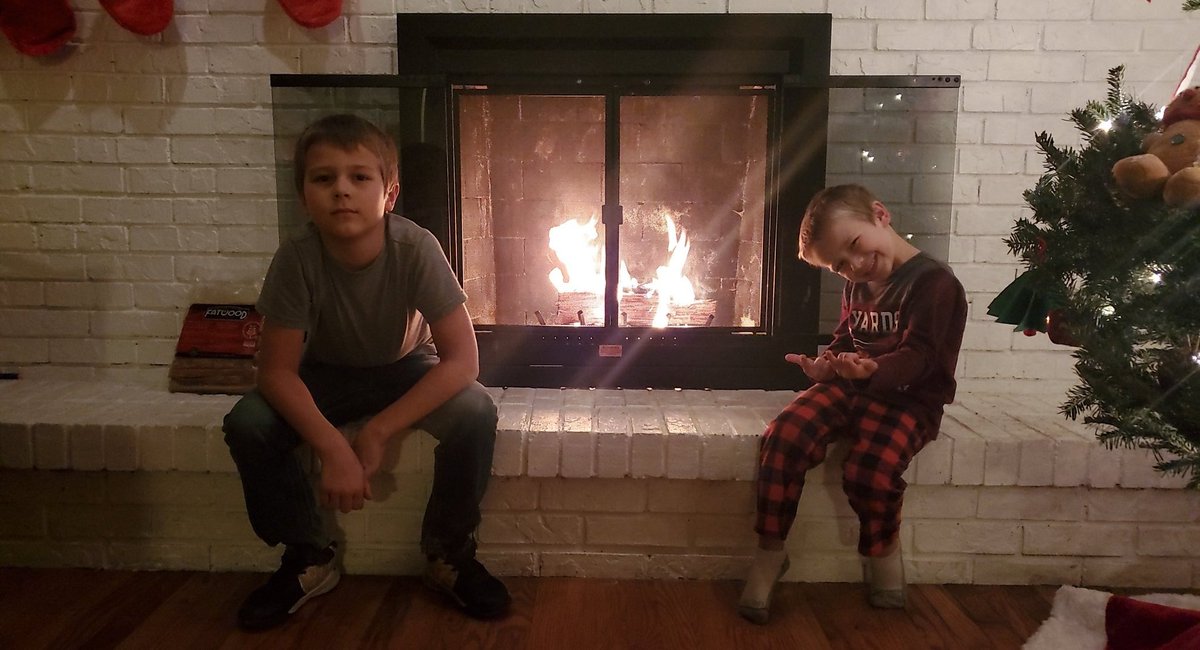 Boys are ready for Xmas this year tree up, fire started, smores and hot chocolate ✔