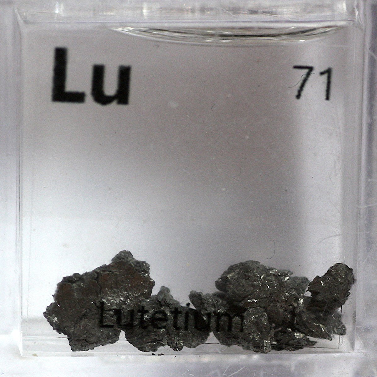 Lutetium  #elementphotos. White compound is lutetium oxide (Lu2O3).