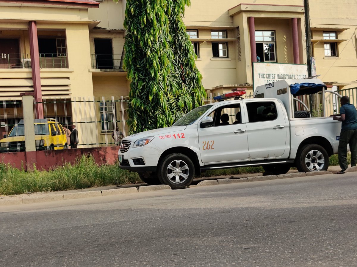 PulseNigeria247's tweet photo. Heavy Police presence at the Yaba Magistrates Court where Eromosele Adene's case is to be heard today. Journalists are currently barred from entry. https://t.co/v2WmM9weOg