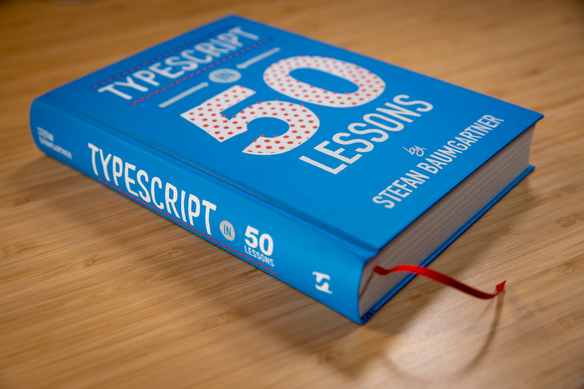 The blue book cover, with squiggly lines and red dots.