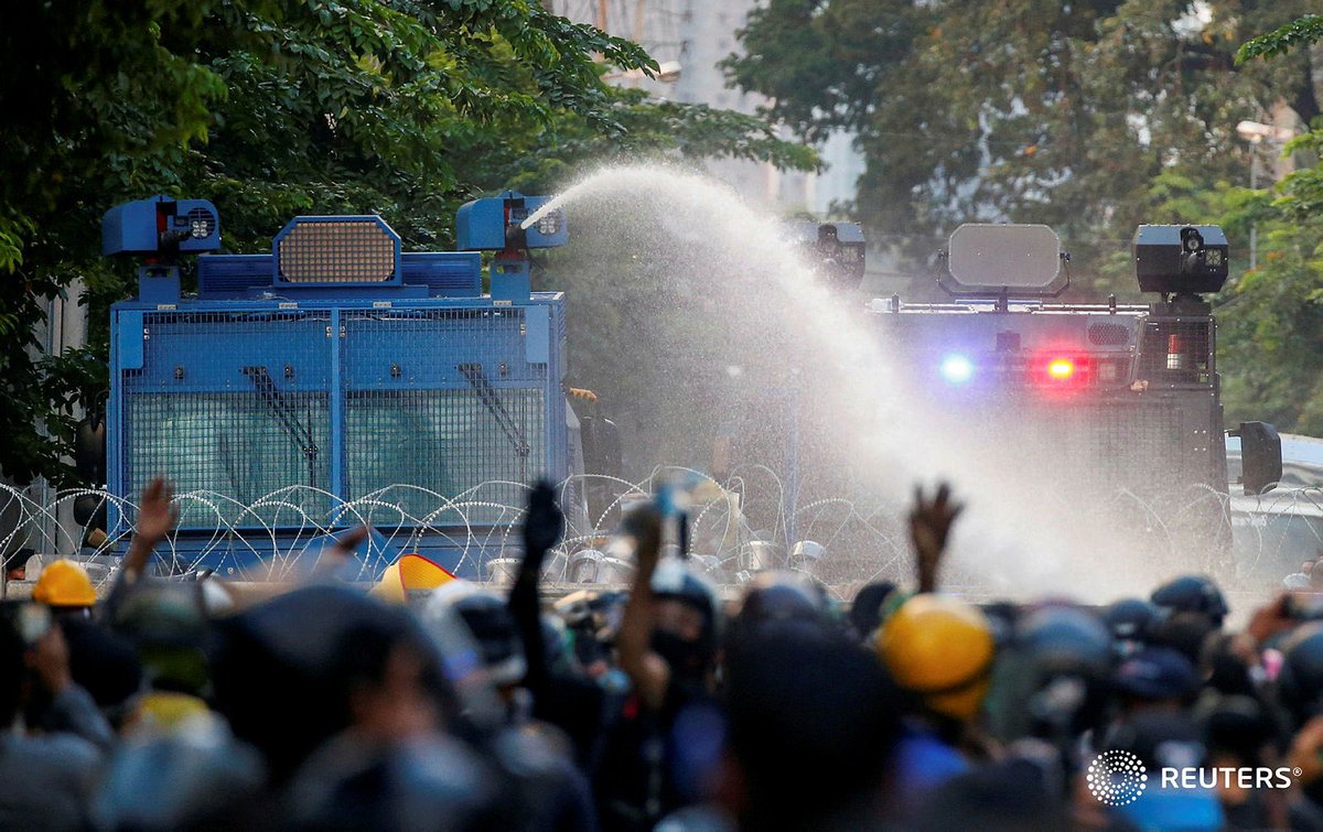 soezeya's tweet photo. Riot police officers stand guard as water cannons are being used during an anti-government protest as lawmakers debate on constitution change, outside the parliament in Bangkok, Thailand, November 17, 2020. REUTERS/Soe Zeya Tun #ม็อบ17พฤศจิกา https://t.co/dGTzlapGLx