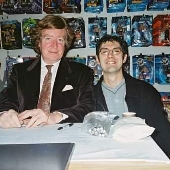 Today's Camping It Up star is the much missed Doctor Who guest star David Collings. David looks so Doctor-ish here, whereas I just look tired! It's Dec 2002 and I'd had a lot of photos done at Tenth Planet that year! David was great, commenting how camp he looked in Robots!