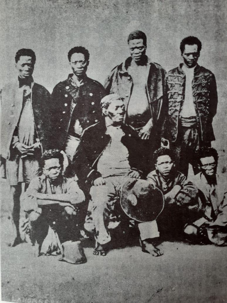 100_storyafrica's tweet image. The barefoot, dressed-down man at the centre of this photo may not look formidable here, but he once ruled the powerful Hlubi people of South Africa, fathered seven sons, and owned 15000 cattle. 

This is Part I of the story of King Langalibalele by Muzi Hadebe... (1/3)